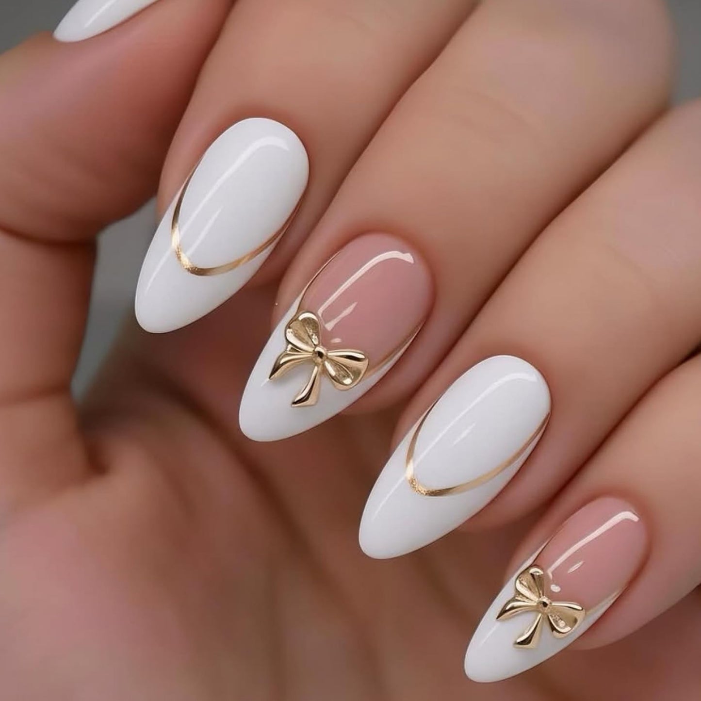 24Pcs Press on Nails Medium Almond Fake Nails,White & Nude Pink French Tip with Gold Lines & 3D Gold Bows Glossy False Nails with Elegant Bow Charms Acrylic Nails Full Cover Stick on Nails for Women