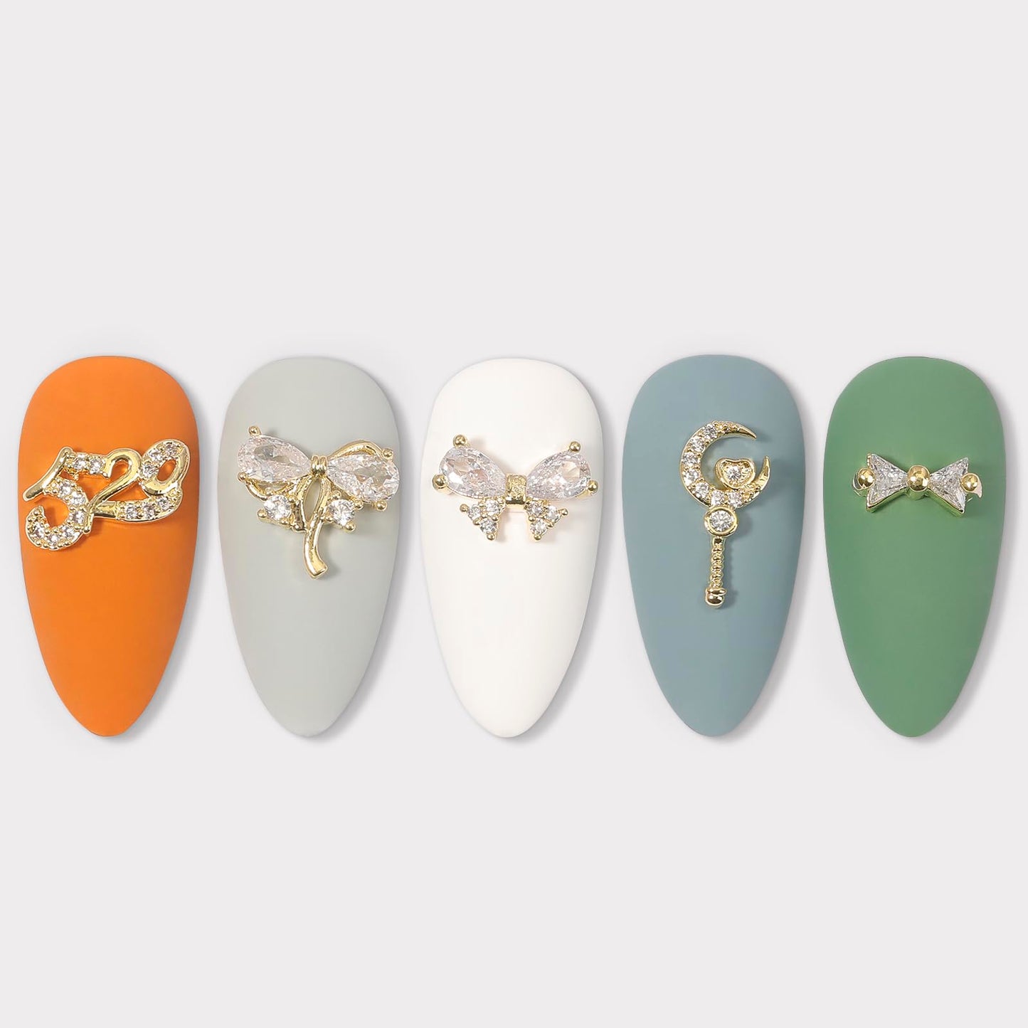 HNUIX Nail Charms and Gems - Gold Copper Zircon, Multiple Shapes 3D Dangle, Metal Luxury Jewelry Rhinestones for Nails 14 Pieces