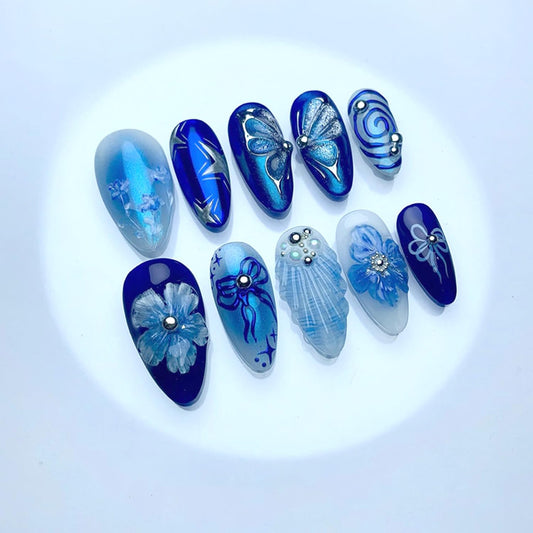 24Pcs Blue Flowers Press on Nails Medium Almond Fake Nails Blue Deep Sea Butterfly, Pearl Shell Pattern Cute Floral Nail Art False Nails Almond-Shaped Stick on Nails Reusable Artificial Nail for Women