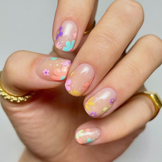 Floral Short Square Press on Nails Soft Nude Base Pastel Pink Purple Blue Yellow Floral Accents Glossy Finish Reusable Spring Nails Easy Apply Party Wear Durable Trendy Women Girls Nail Art 24 Pcs