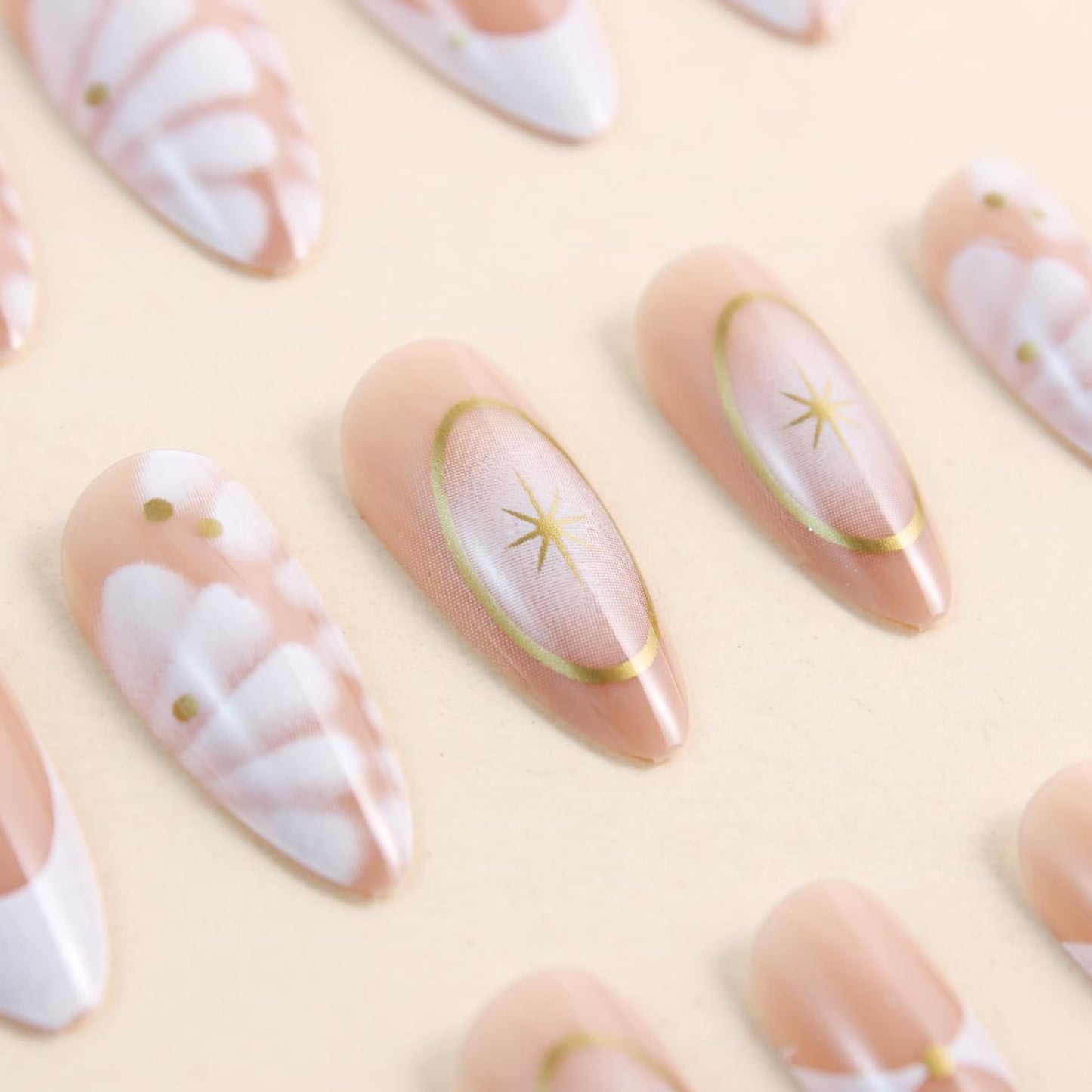 French Almond Press On Nails Medium Length, Nude Fake Nails with Starburst & Gold Line Design, Glossy Gel Finish Acrylic Nails, Reusable Glue On Nails for Women, 24Pcs