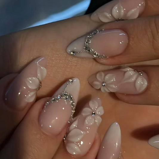 White Embossed Flower Press On Nails Almond Medium Fake Nails With Rhinestone Chain Design French Nail Press Ons Pink Glossy False Nails Spring Acrylic Nails For Women