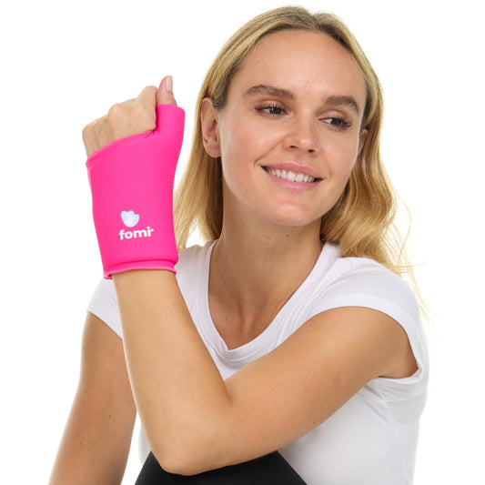 FOMI Wrist Solid Gel Ice Pack | Hot Cold Hand and Thumb Compression Sleeve Wrap for Carpel Tunnel, Arthritis, Tendonitis, Bruises, Swelling, Sports Injuries Pain Relief (Pink - Small/Medium)