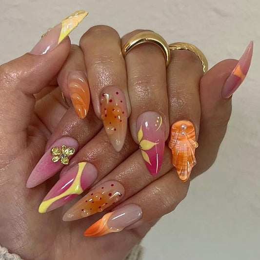BABALAL Press On Nails, Medium Almond Fake Nails, Sunset Orange Pink Marble with Gold Flower Charm, Glossy Summer Tropical Glue On Nails for Women and Girls 24Pcs Reusable