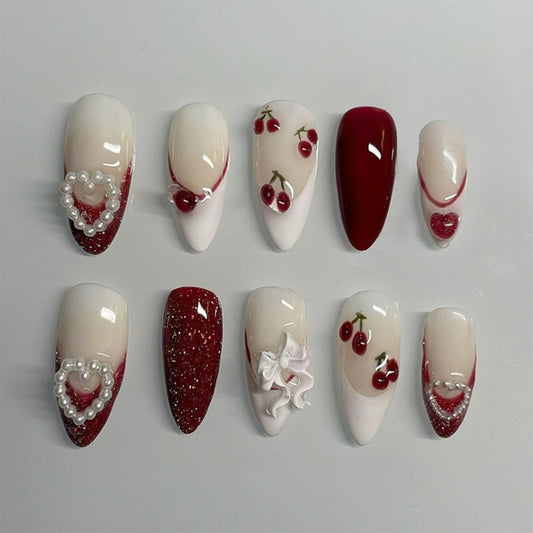 24Pcs Valentines Press on Nails Medium Almond Fake Nails with White Bow Cherry Heart Designs Artificial Acrylic Glue on Nails Red French Tip False Nails 3D Pearl Full Cover Stick on Nail for Women
