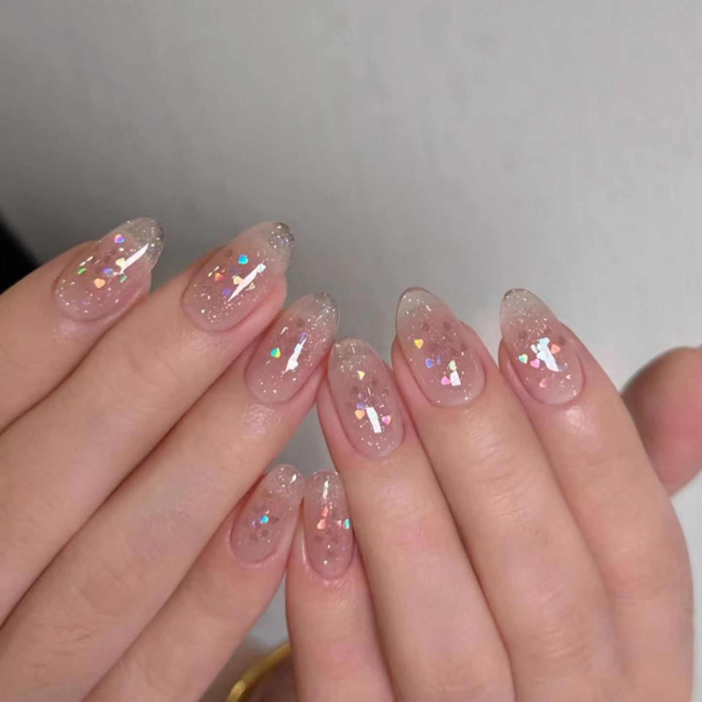 Cute Pink Glitter Press On Nails Almond Shape – Medium Length Nude Gradient Acrylic Fake Nails with Iridescent Hearts & Confetti, 24Pcs Glossy Stick On Nails Kit with Glue for Girls & Women Party