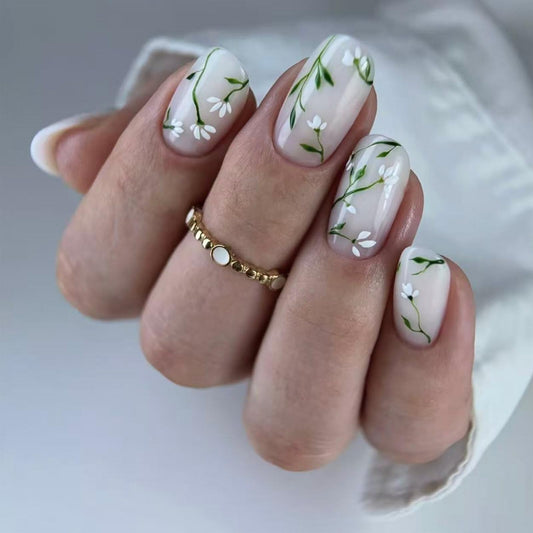 Floral Medium Oval Press on Nails Milky White Base White Floral Accents Green Vine Details Glossy Finish Reusable Spring Nails Easy Apply Wear Durable Trendy Women Girls Nails Art 24 Pcs