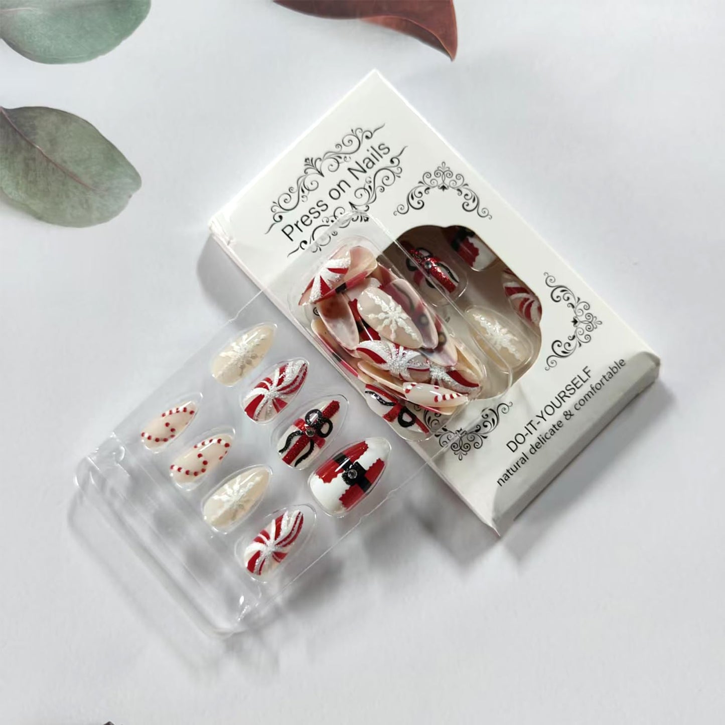 30Pcs Christmas Press on Nails Almond Fake Nails with Santa Claus Gift Designs Snowflake Candy Cane False Nails Red White Stripes Artificial Glue on Nail Holiday Stick on Nail for Women
