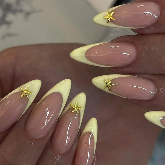 IMSOHOT Press on Nails Long Stiletto Fake Nails with Golden Star Charms Designs Yellow French Tip Glossy Acrylic False Nails Full Cover Gel Almond Nail Supplies