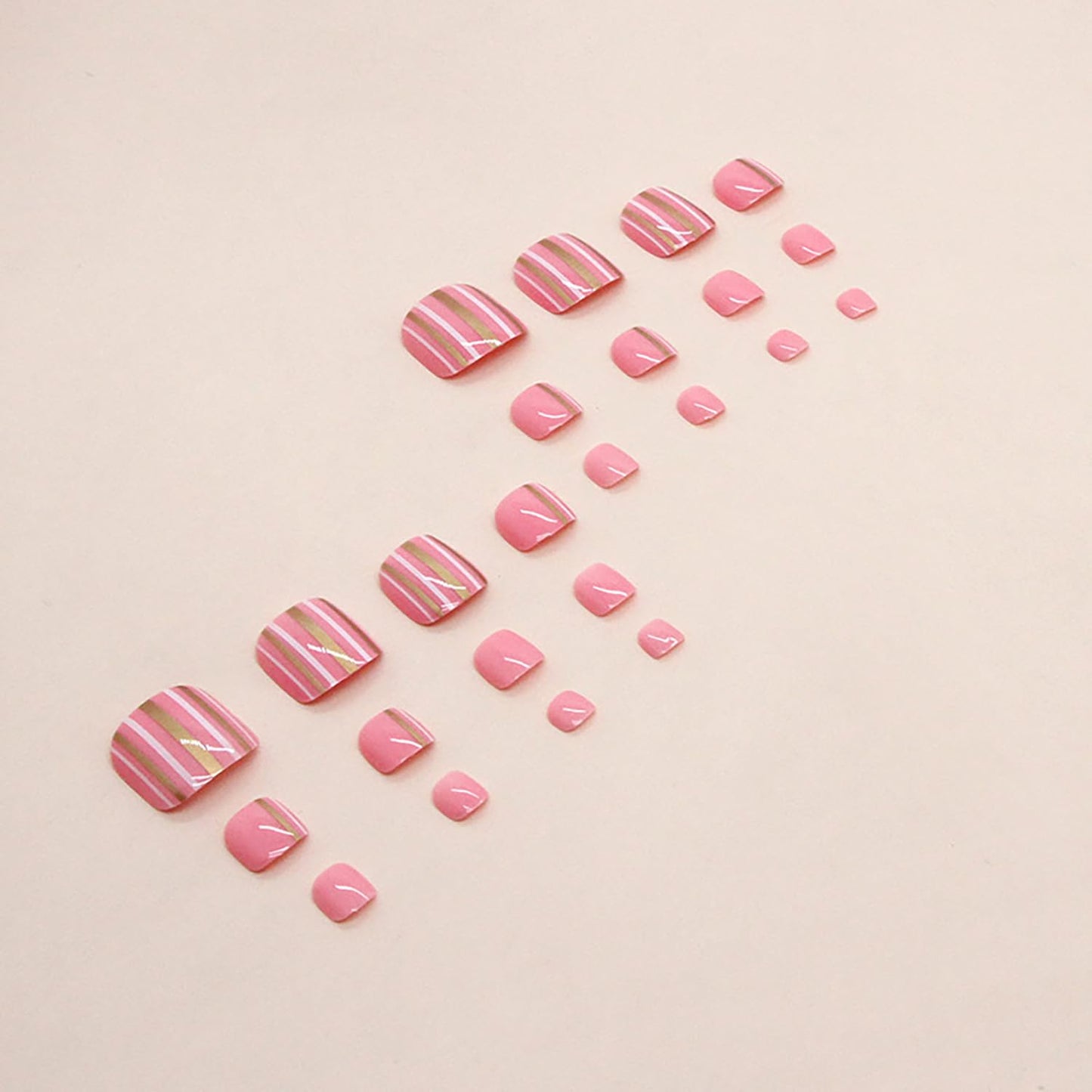 Vezocim Press on Toenails with Gold White Line Designs, 24Pcs Pink Artificial Short Fake Toenails, Glossy Full Cover Acrylic False Nails for Toe, Glue Toenails with Charm for Women