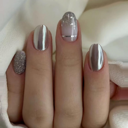 BABALAL Press on Nails Short Round Fake Nails Oval Glue on Silver Chrome Acrylic Nails Glitter Bling 24Pcs Manicure False Nails for Women Girls