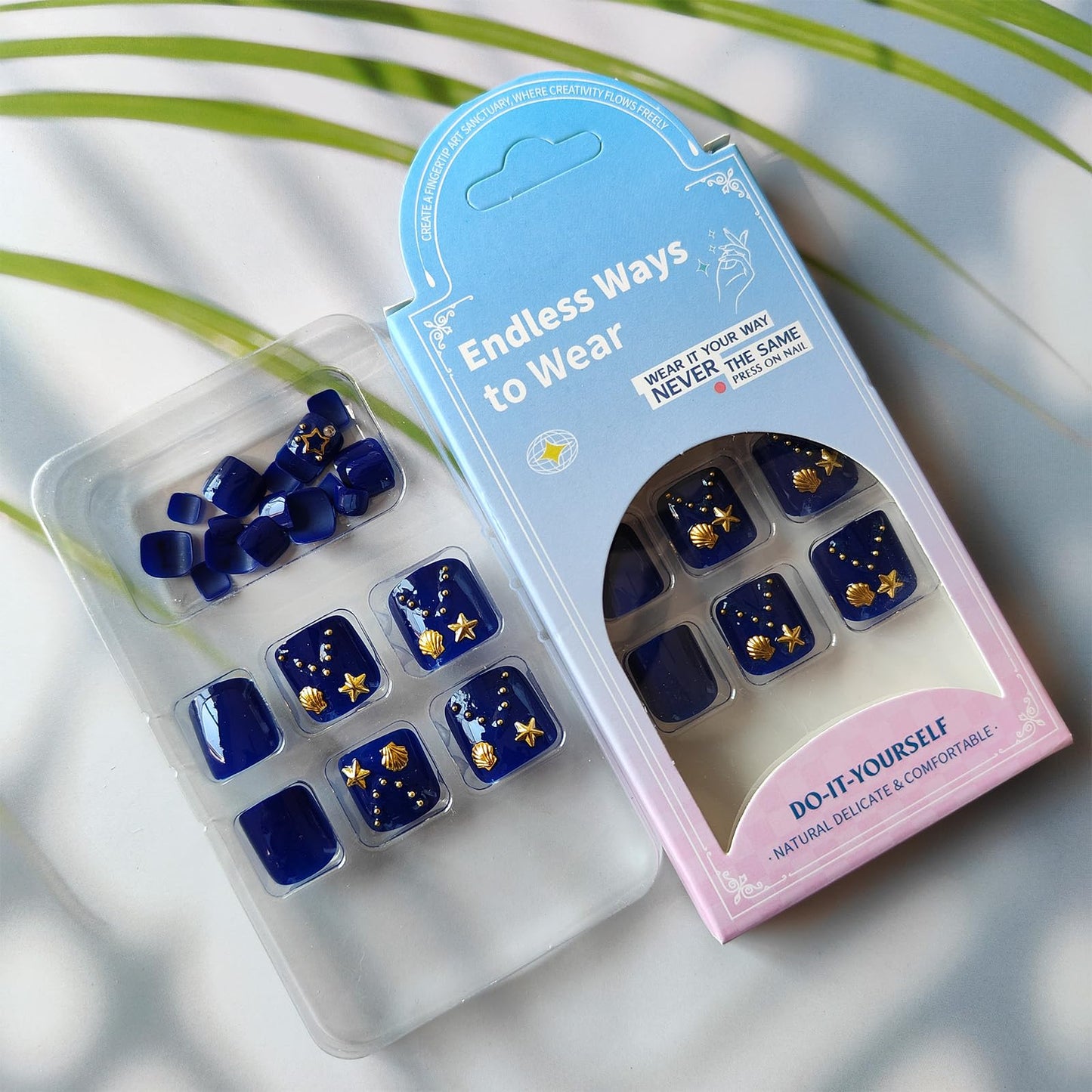 Navy Blue Press on Toenails with Shell Starfish Charms Gold Star Moon Design Fake Toe Nails Glossy Acrylic Toenails Artificial Toe Nails Glue on Summer Press on Toes for Women 24Pcs