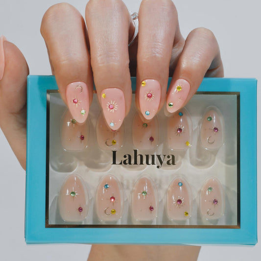 Lahuya Press On Nails – Celestial Charm | Designer-Created Short Almond Nude Pink Fake Nails with Colorful Rhinestones, Moon & Sunburst Accents, Glossy Finish | 30 Nails