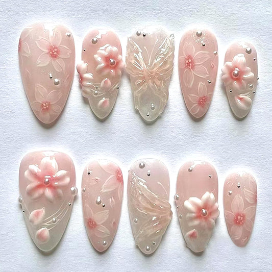 CJDLTS Pink Flower Press on Nails Medium Almond Shaped Artificial Acrylic Nails Gradient 3D Floral with Pearl Design Stick on Nails Full Cover Reusable Coffin Artificial Fingernails for Women Manicure