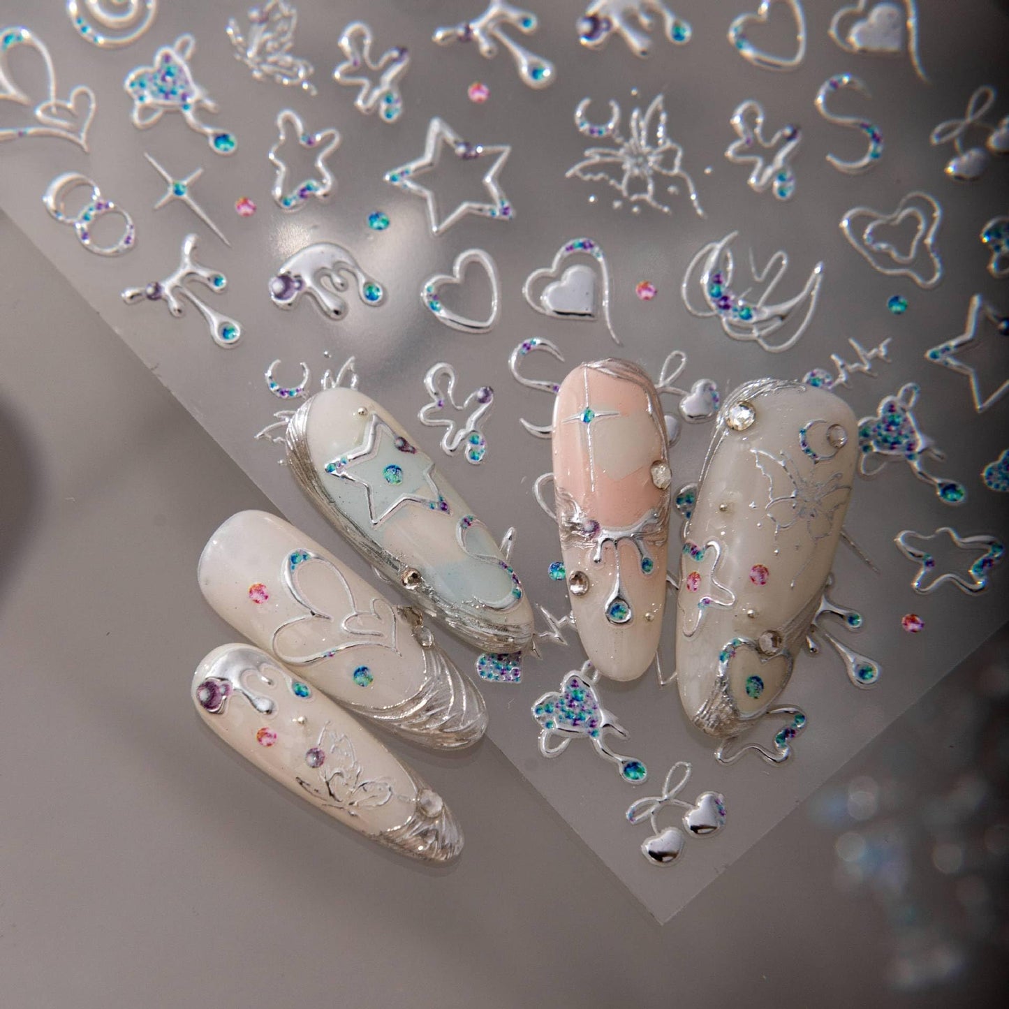 5D Embossed Silver Y2K Nail Art Stickers, Heart Star Moon Nail Decals with Rhinestone Accents, Self-Adhesive Celestial Nail Decorations for Acrylic Gel Nails, DIY Manicure Supplies for Women (1 Sheet)