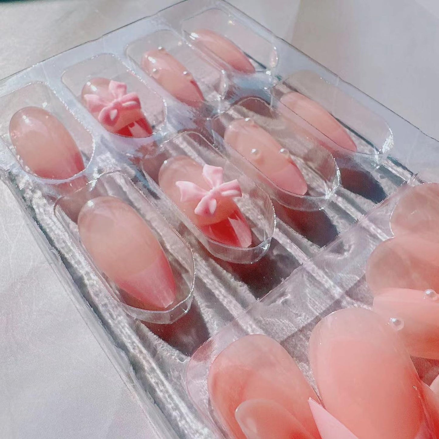 24Pcs French Press on Nails Almond Fake Nails with Bow Pearl Design Pink French Tip False Nails Cute Pink Press on Nail Tips Glossy Artificial Nails Acrylic Stick on Nail for Women Manicure