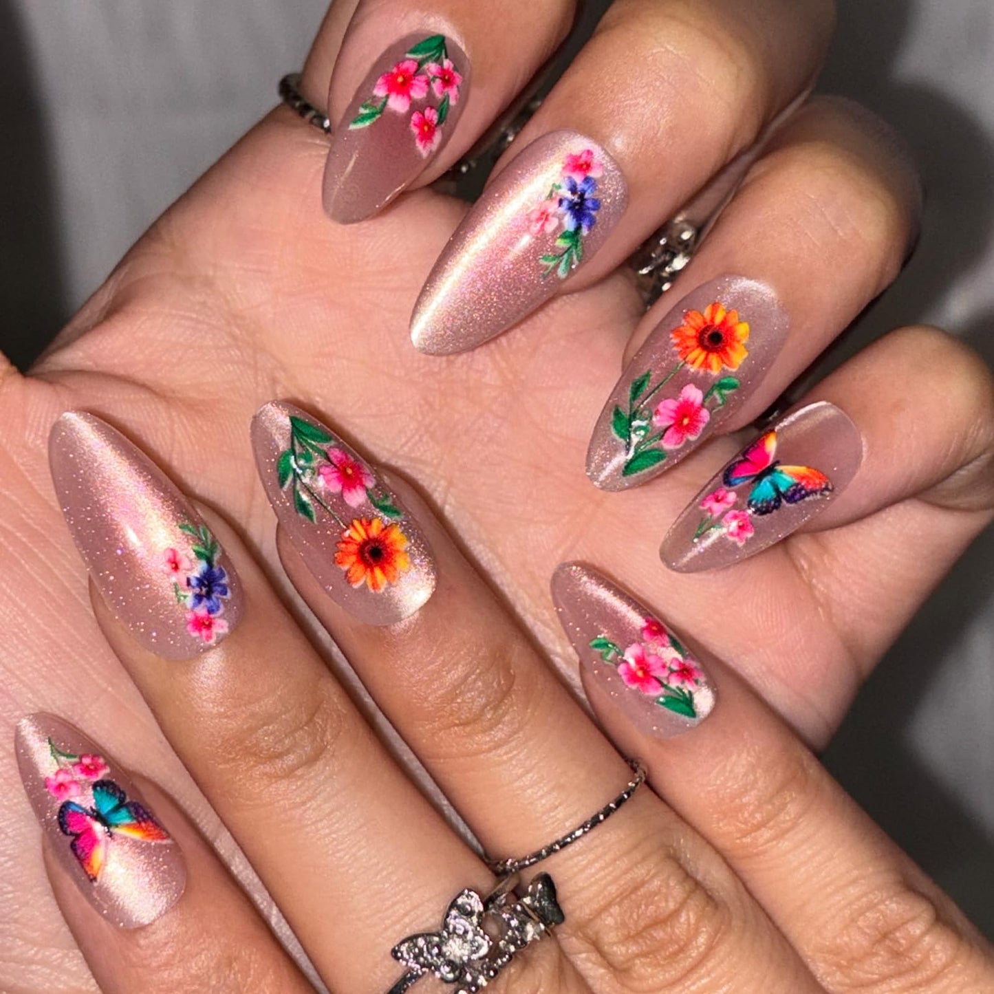 Spring Press on False Nails Pink Cat Eye Glue on Nails Medium Almond Fake Nails with Colorful Butterfly Flower Designs Glossy Press ons Stick on Nail for Women Manicure 24Pcs