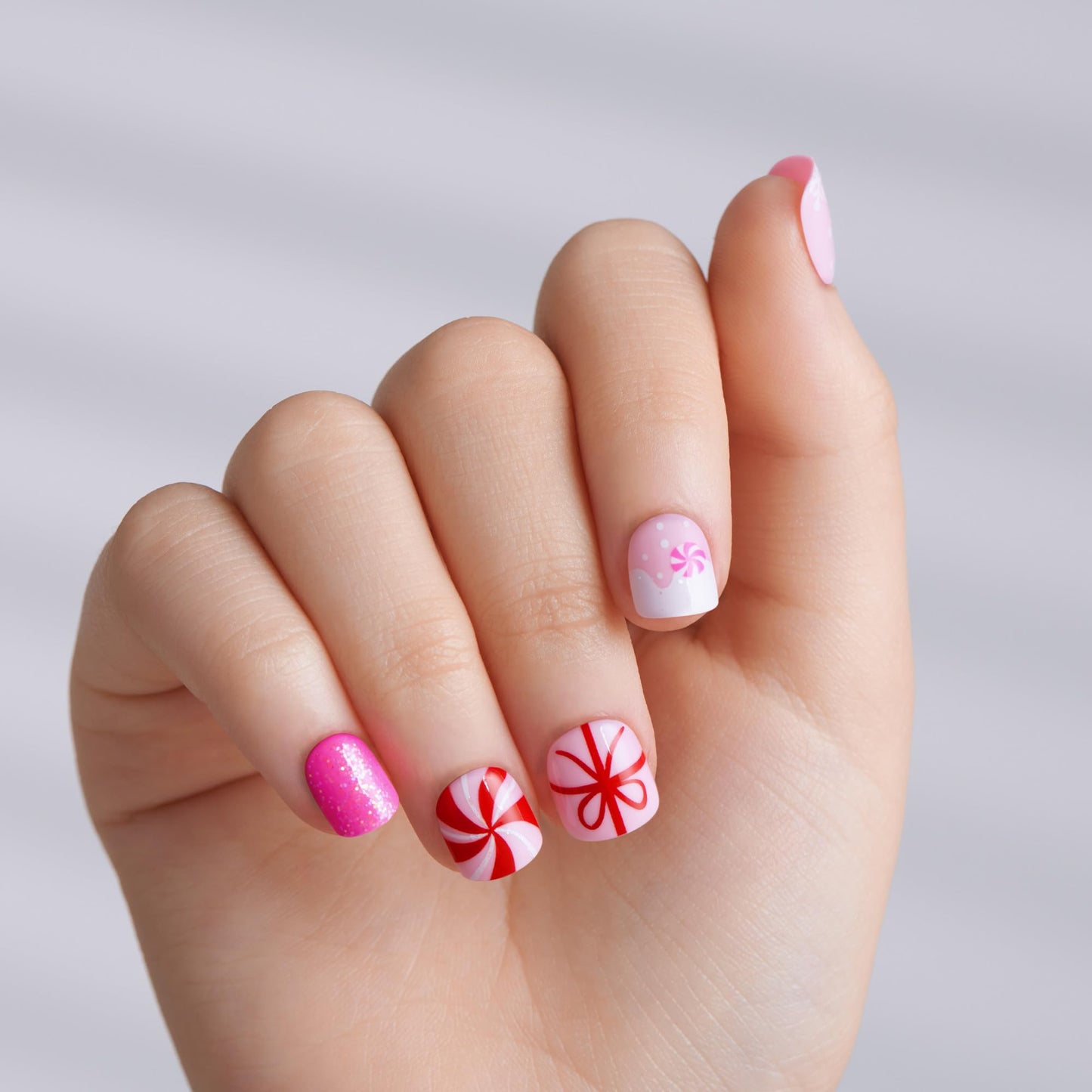 KISS imPRESS Mini Holiday Press On Nails for Kids, ‘Frostsnow’, Pink, Child Size, Squoval Shaped, Mess-Free, Mom Approved, Non-Toxic, Breakaway Application Tabs, Nail File, 20 Fake Nails (Pack of 2)
