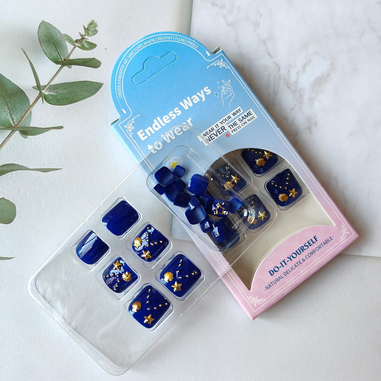 Navy Blue Press on Toenails with Shell Starfish Charms Gold Star Moon Design Fake Toe Nails Glossy Acrylic Toenails Artificial Toe Nails Glue on Summer Press on Toes for Women 24Pcs