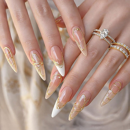 RUOKEXIN Long Stiletto Press on Nails French Tip Fake Nails Nude False Nails with Gold Flower Designs Almond Nail Press ons Sparkly Artificial Nails for Women 30Pcs
