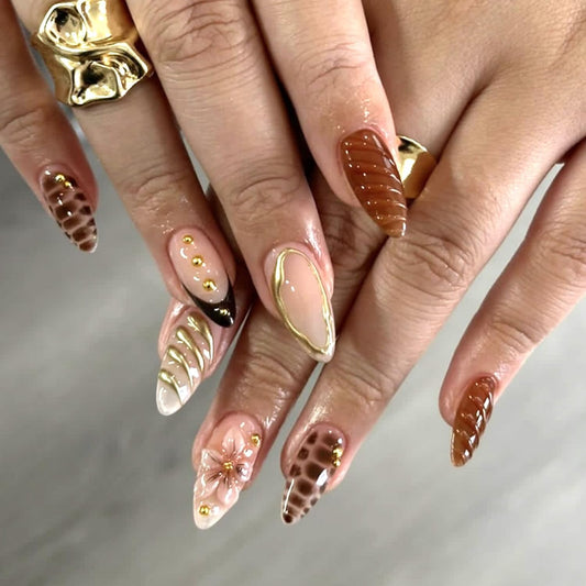 Brown Soft Gel Press On Nails Medium Almond Faken Nails with 3D Flower Designs Gold Edge Nails Press ons Snake Pattern False Nails Glossy Reusable Glue on Nails for Women Girls 24PCS