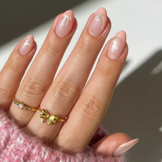 French Press on Nails Short Almond Fake Nails Pink with Bow Starlight Designs Full Cover Acrylic Glue on Nails Removable Artificial Stick on Nails for Women 24 Pcs