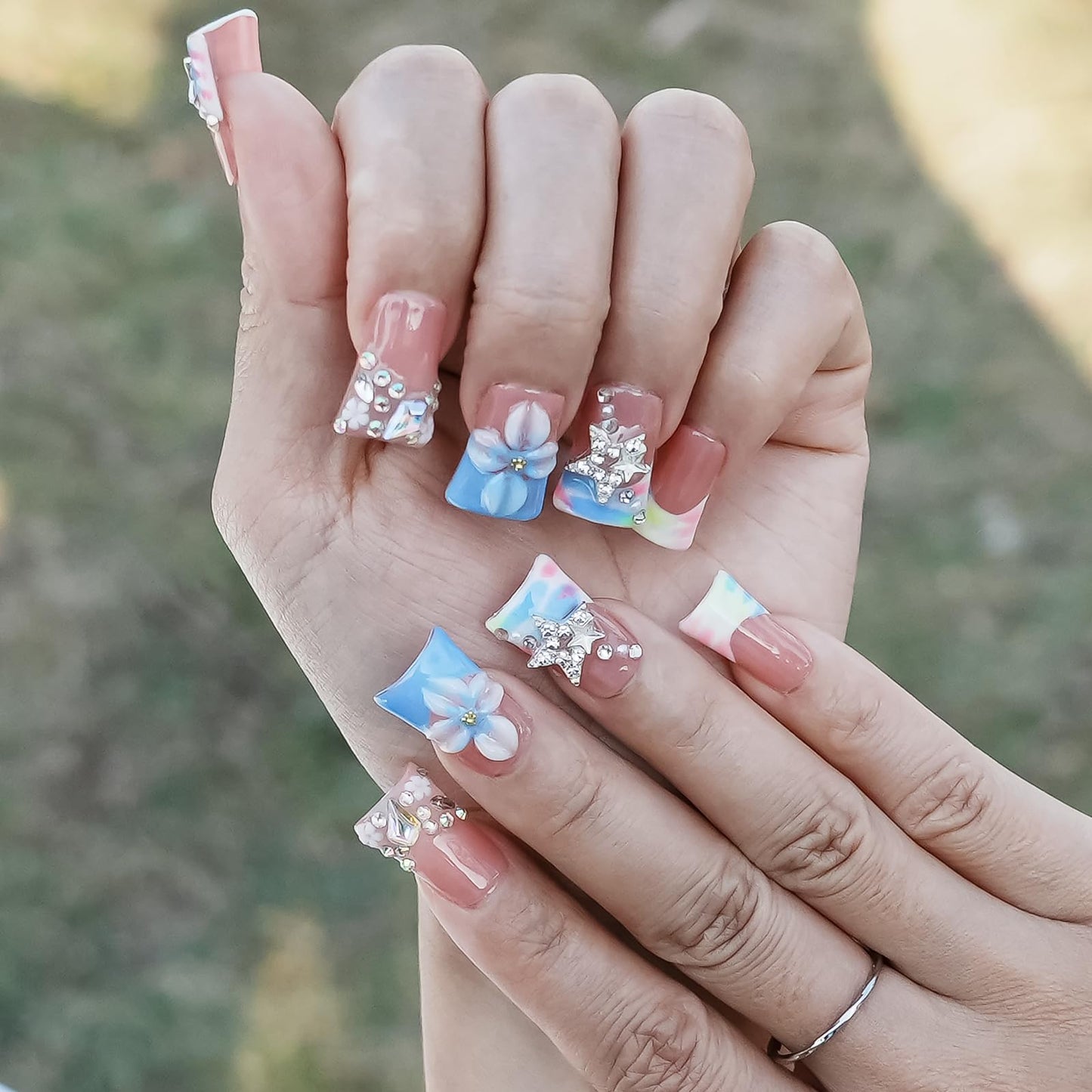 Tesytto Press on Nails Duck Shape 3D Floral Metallic Star Design Luxury Thick Acrylic Fake Nails Rhinestones Petal Flower French Tip Blue False Nails (Pastel Pink-Blue Stellar,M)