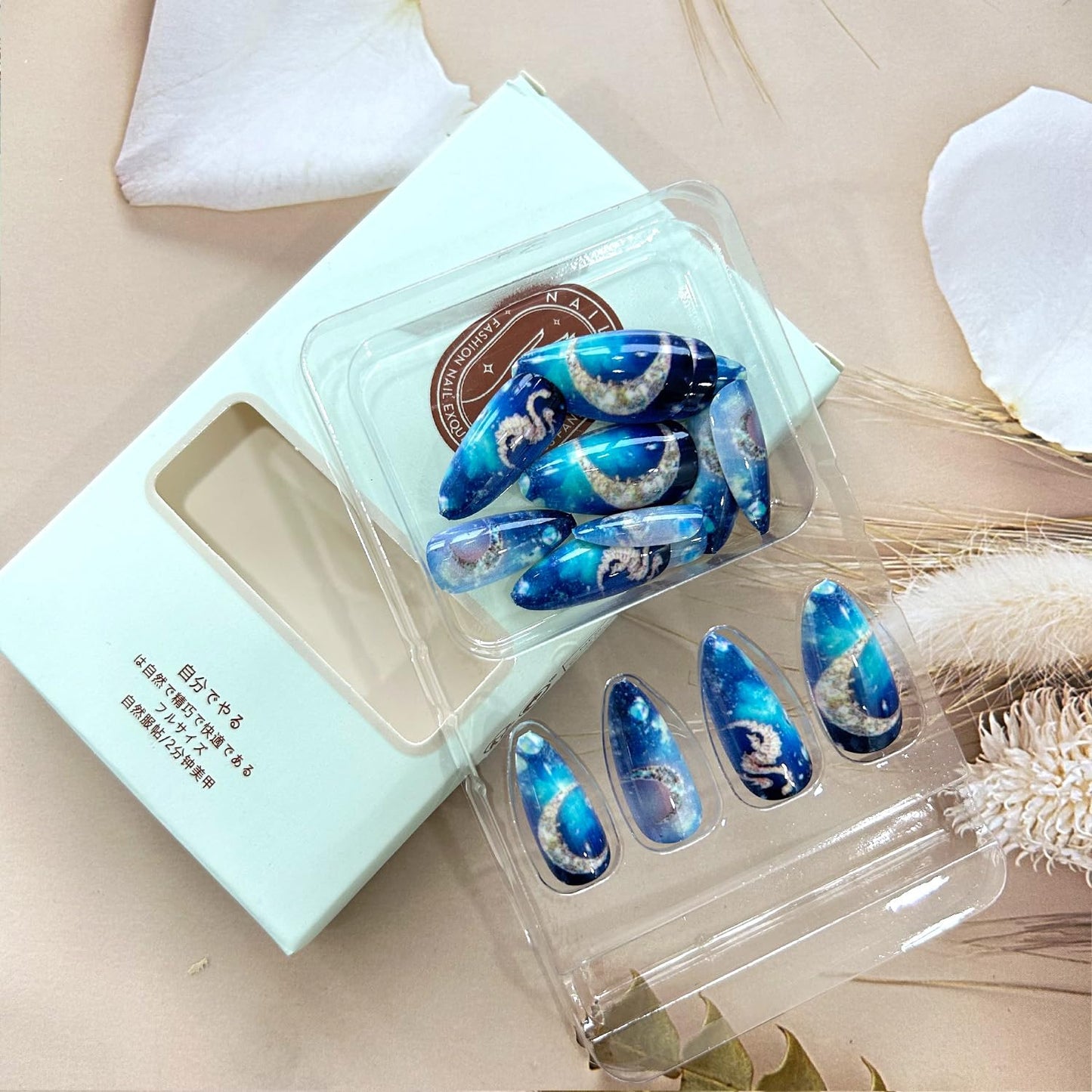 24Pcs Dark Blue Starry Sky Press on Nails Medium Almond Shaped Moon Planet Pattern Design Handmade False Nails Full Cover Glossy Acrylic Atrificial Fingernails Blue Smudge DIY Stick on Nails for Women