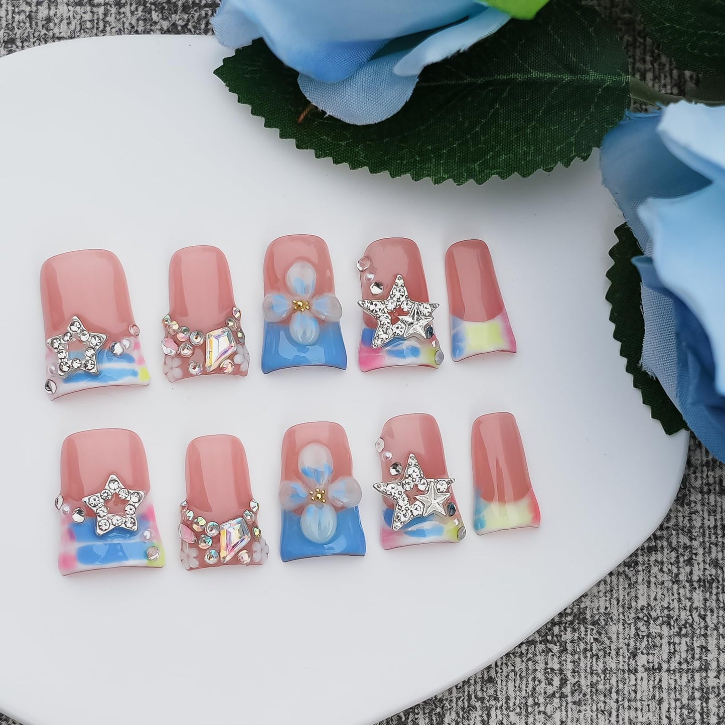Tesytto Press on Nails Duck Shape 3D Floral Metallic Star Design Luxury Thick Acrylic Fake Nails Rhinestones Petal Flower French Tip Blue False Nails (Pastel Pink-Blue Stellar,M)