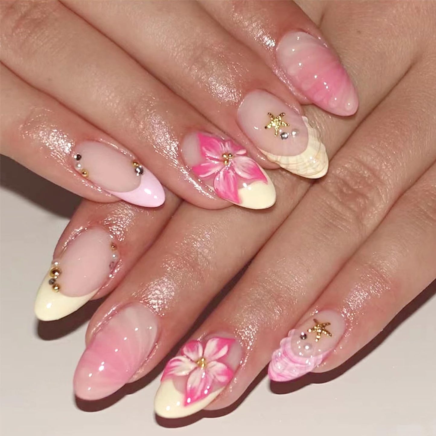 Cute Flower Press on Nails Medium Almond French Tip Fake Nails 3D Pink Gradient Flowers False Nails with Rhinestone Gold Beads Charms Design Acrylic Nails Golden Starfish Glue on Nail for Women 30Pcs
