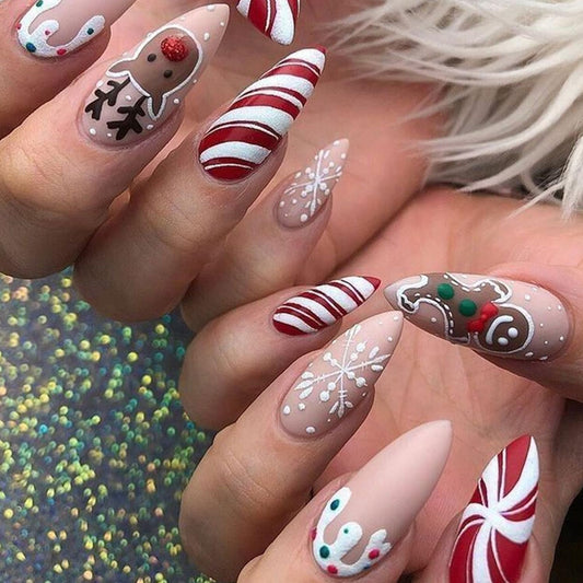 CJDLTS Snowflake Press on Nails Medium Artificial Almond Acrylic False Nails Cute Elk Gingerbread Man Design Stick on Nail Christmas Fake Nail Full Cover Winter Artificial Fingernails for Women 24Pcs
