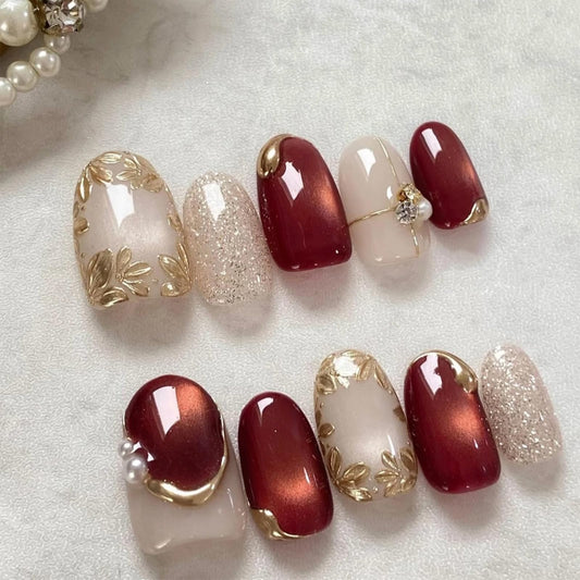 24Pcs Gold Flower Press on Nails Short Almond Fake Nails with 3D Pearl Floral Design Red Cats Eyes Glitter False Nails Reusable Acrylic Stick on Nail for Women Manicure Wedding Party Holiday Nail Art