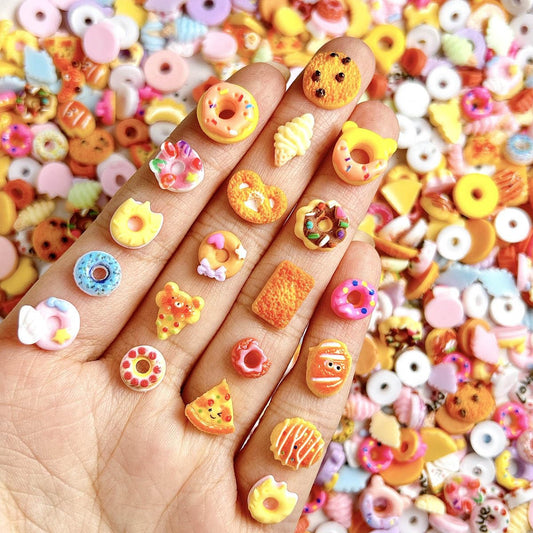 AWDSLUY 50Pcs Colorful Snack Nail Art Charms 3D Resin Food Flatback Nail Charms Donut Nail Supplies Biscuit Bread Ice Cream Pizza Nail Art Rhinestones Mixed-Style Food Toys Nail Art Accessories DIY