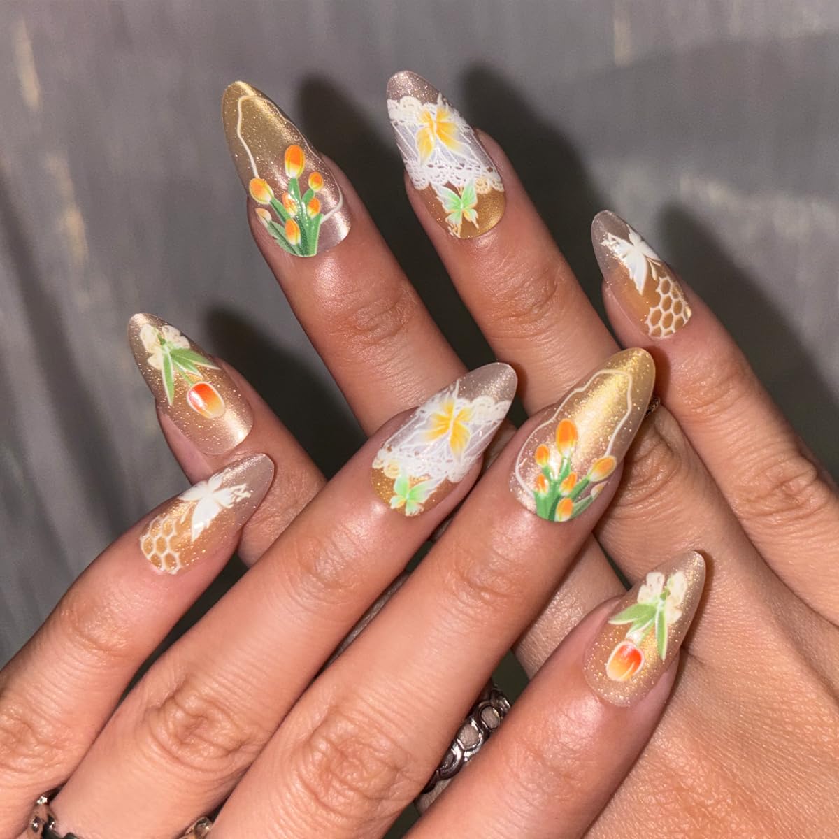 Spring Press on False Nails Gold Ombre Cat Eye Fake Nails Medium Almond Glue on Nails with Tulip Butterfly Designs Press ons Stick on Nail for Women Manicure 24Pcs