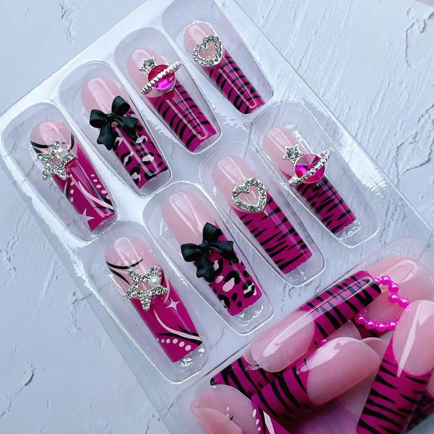 24Pcs Long Press on Nails Sweet Cool Fake Nails with Leopard Pearl Star Heart Planet Bow Charms Acrylic Nails Press ons Cute Design False Nail Art Full Cover Long Coffin Nail Tips Manicure for Women
