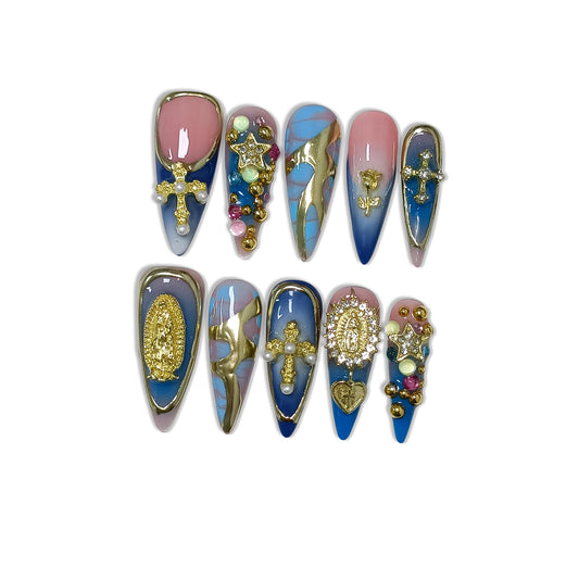 Hantyer 10pcs Vintage Press on Nails with Tools Kit, Long Stiletto Glossy Blue Marble Nails, Gold Cross & Star Charms with 3D Hand-Painted Lines on Nails, Reusable & Easy Apply for Galas (Size M)