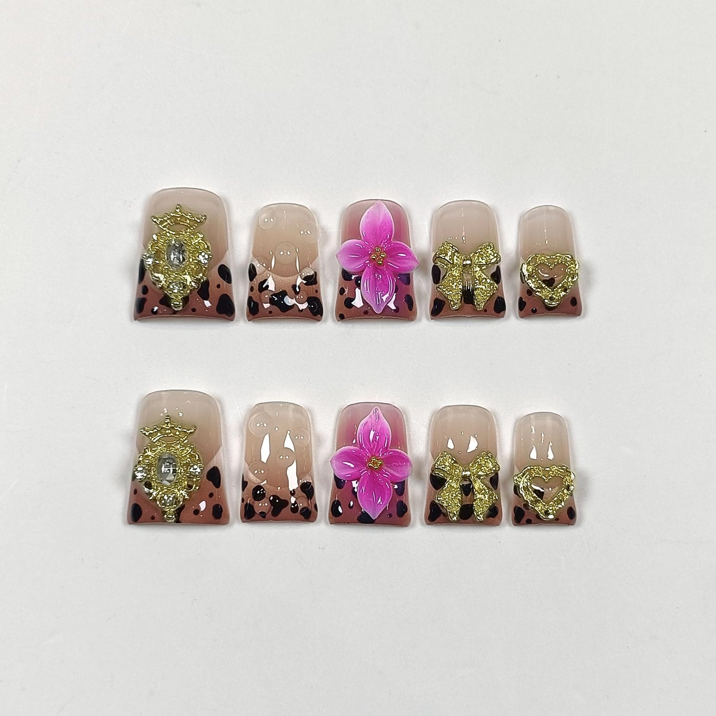TENPAL Duckbill Nails,Brown Leopard French Tips Press on Nails with Kit,Soft Gel Fake Nails with 3D Charms Hearts Bows Flowers,Metallic Edgy Punk Y2K False Nail with Rhinestone for Winter Fall(S)