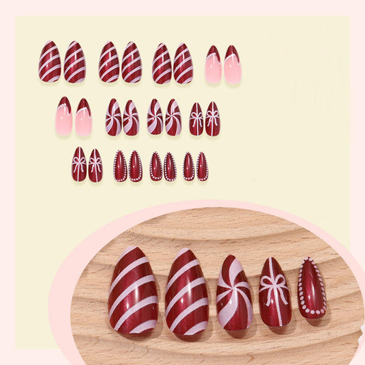24Pcs Christmas Hat French Tip Press on Nail Red Medium Almond Fake Nails with Stripe Designs Vortex Xmas Full Cover False Nails Bow Nude Pink Stick on Nail for Women Holiday Manicure Kit