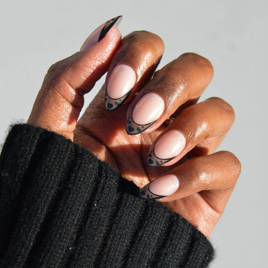 Glamnetic Press On Nails - Love Noir | Short Almond Fake Nails in Semi-Transparent Black French Tips with Opaque Outline and Heart Details | 15 Sizes - 30 Nail Kit with Glue