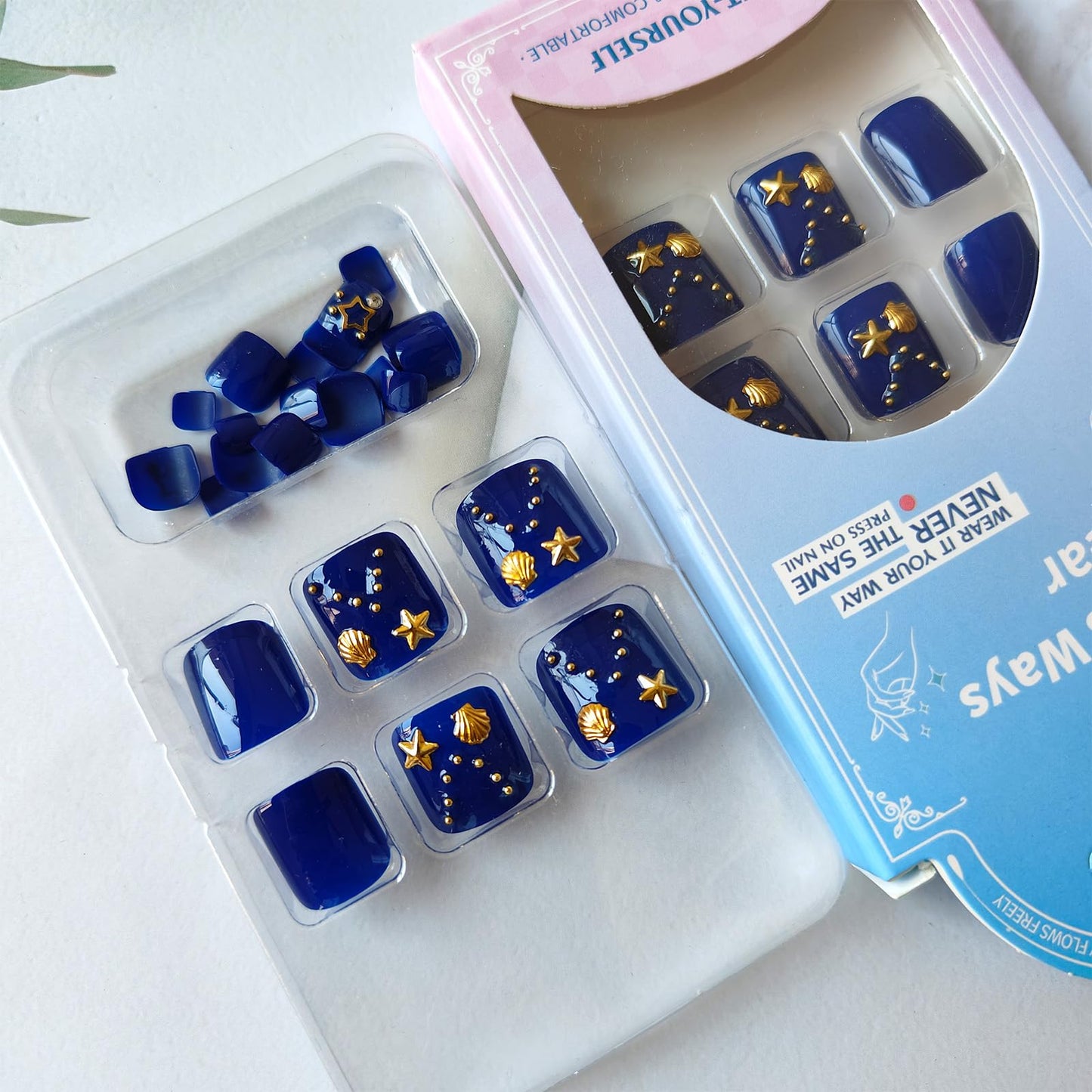 Navy Blue Press on Toenails with Shell Starfish Charms Gold Star Moon Design Fake Toe Nails Glossy Acrylic Toenails Artificial Toe Nails Glue on Summer Press on Toes for Women 24Pcs