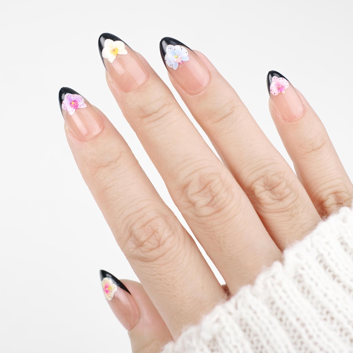 NAILIQUE Press On Nails Short Almond, Handmade Soft Gel Black French Tip Fake Nails with 3D Orchid Flower Art, 26pcs Reusable Nail Tips with Glue & Remover, Salon Quality Summer Manicure
