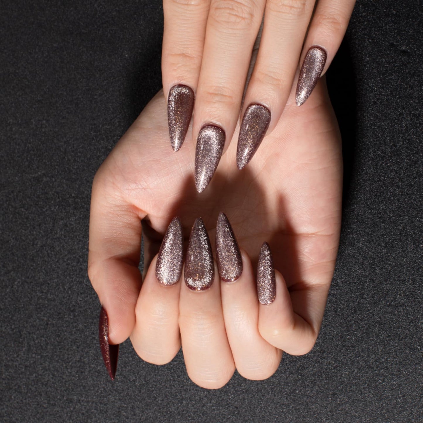 Gentle Claws Press-On Nails, Syrup - 24 Pcs Reusable Acrylic False Nails in Stiletto Shape, Medium Long Almond with Cat Eye Design, Full Well Tips, Pink Shimmery Finish, for Women and Girls