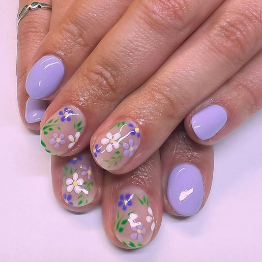 Press on Nails Short Length Flower False Nail with White Flower Green Leaves Design Purple Full Cover Glossy Acrylic Fingernails Oval Artificial Stick on Nail Reusable Glue on Nails for Women 24Pcs