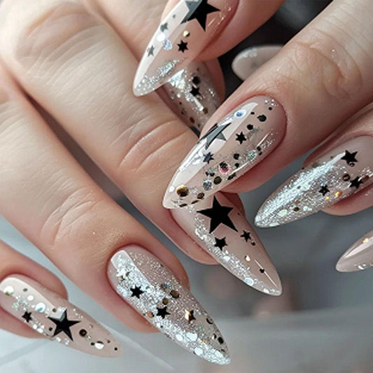 IMSOHOT Medium Press on Nails Almond Nude Fake Nails with Black Star & Silver Glitter Designs Full Cover Glossy Y2K Nail Supplies Acrylic DIY Nail Art Stick on False Nails for Women
