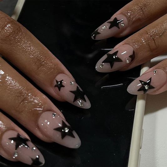 Black Star Press on Nails Medium Almond Fake Nails Nude Pink with Rhinestone Design Stick on Nails Full Cover Acrylic Nails Star False Nails Glitter Luxury Glue on Nails for Women DIY Manicure 24Pcs
