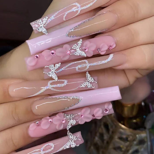 24Pcs Long Square Press on Nails Pink French Tip Fake Nails Silver Rhinestones with Flower Full Cover Tips Glue on Nails Artificial Acrylic False Nails Butterfly Charms Design for Women Manicure DIY