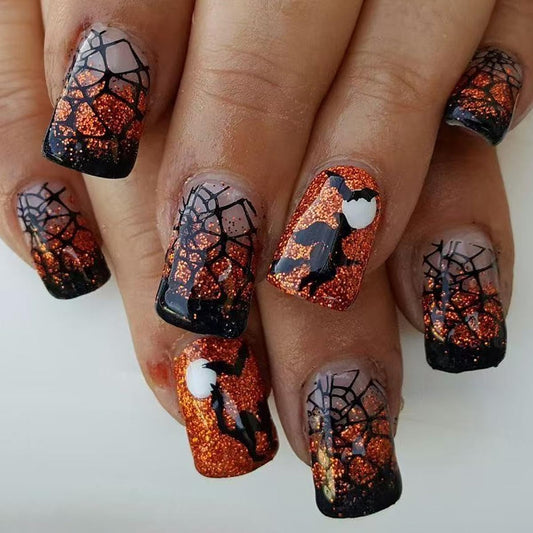 Halloween Press on Nails Short Square Fake Nails Spider Web Bat Cat Witch Designs Stick on Nails French Tip False Nails Orange Glitter Nail Artificial Acrylic Glue on Nail for Women Manicure 24Pcs