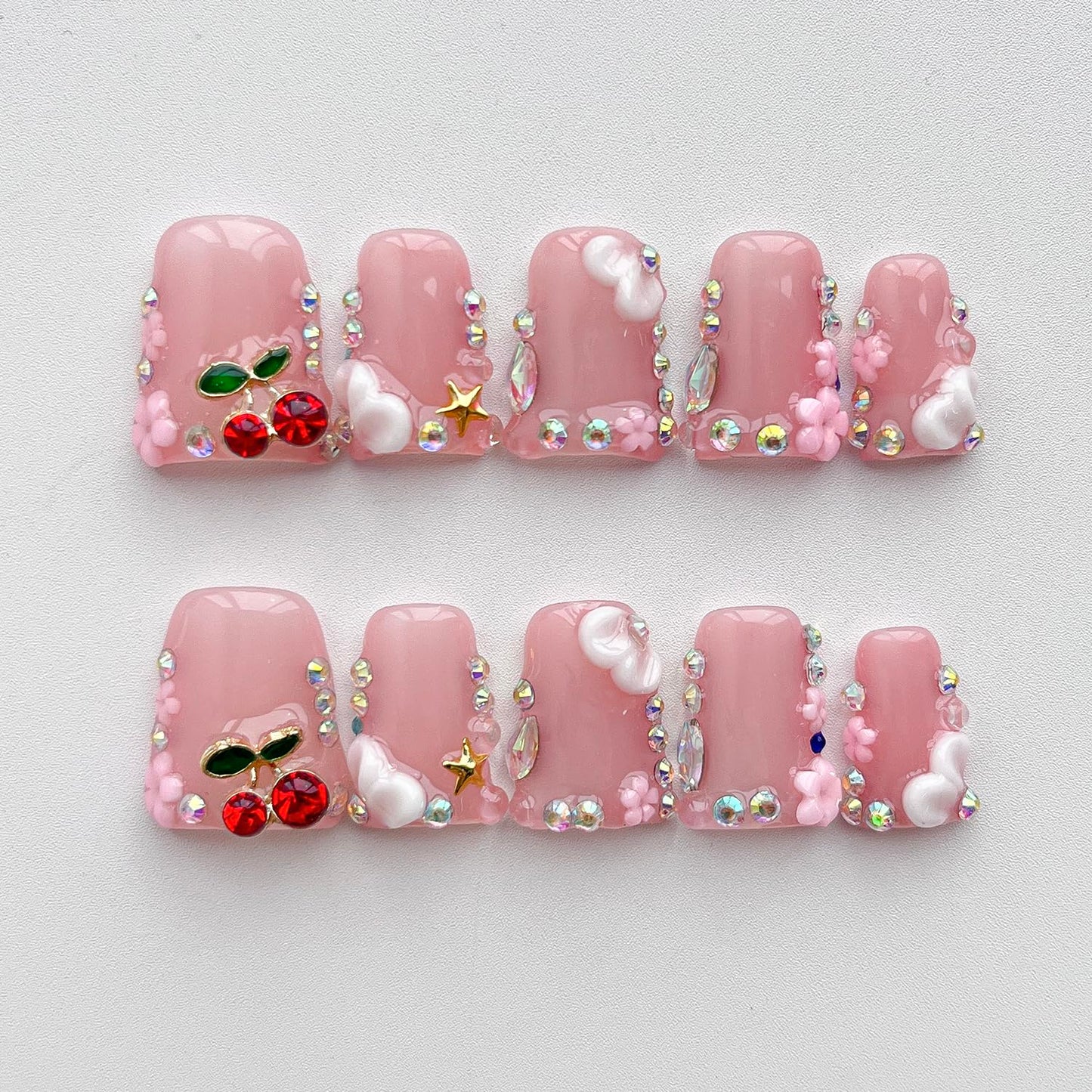 Handmade Press on Nails Short Duck French Tip Thick Acrylic Fake Nails 3D Floral False Nails with Cherry Rhinestones Charms Designs Nude Pink Sturdy Nail Art Press on Nails 10Pcs(S)