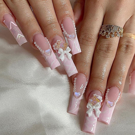 SUMINGGO 24Pcs Press on Nails Medium Almond - Fake Nails With Designs Full Cover With Glue Press ons Reusable Artificial Stick on Nails for Women (Pink Bowknot)