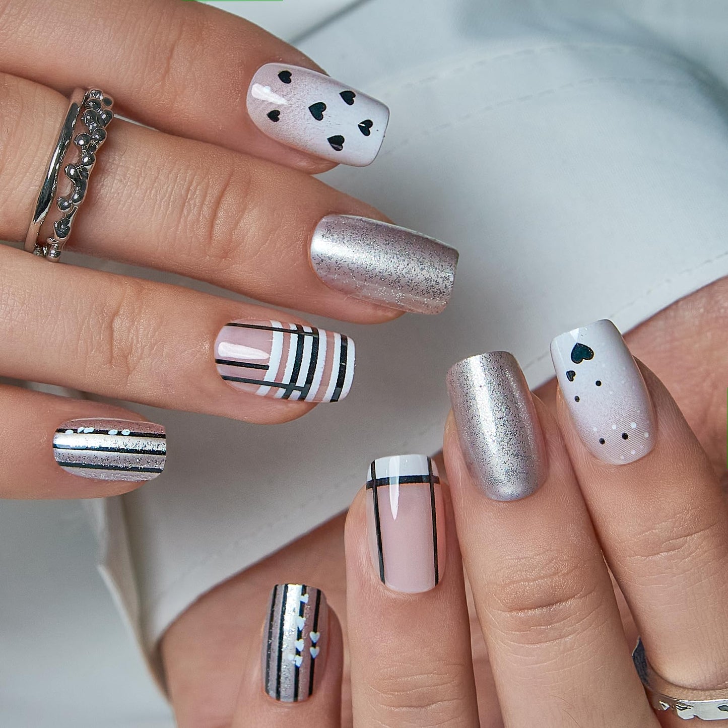 CurvLife Press On Nails Short Square Black White Heart, Glossy Soft Gel Fake Nails with Stripes and Silver Glitter, Reusable Salon Look Manicure for Women Teens Beginners, 30pcs, Daily Wear Work Party